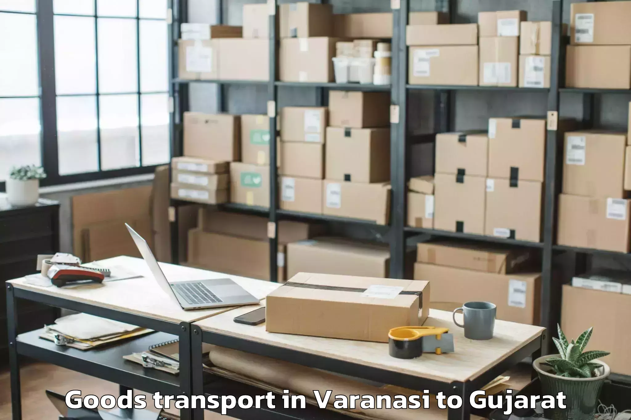 Quality Varanasi to Dharmsinh Desai University Nad Goods Transport